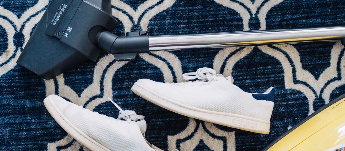 A carpet and a vacuum cleaner